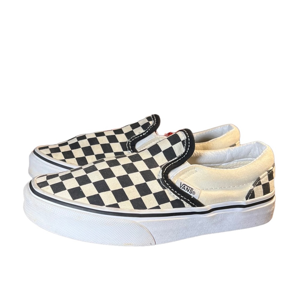 Vans Classic Slip-On, Kid’s 1.5. Black and marshmallow checkers.